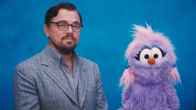 Dr. Randall Mindy with purple puppet