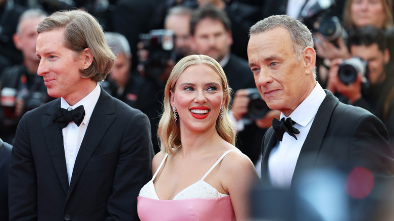 Wes Anderson, Scarlett Johansson and Tom Hanks attend the "Asteroid City" red carpet at Cannes Film Festival