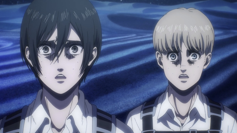 Mikasa and Armin staring in horror