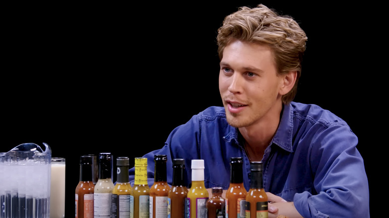 Austin Butler speaking during his Hot Ones interview