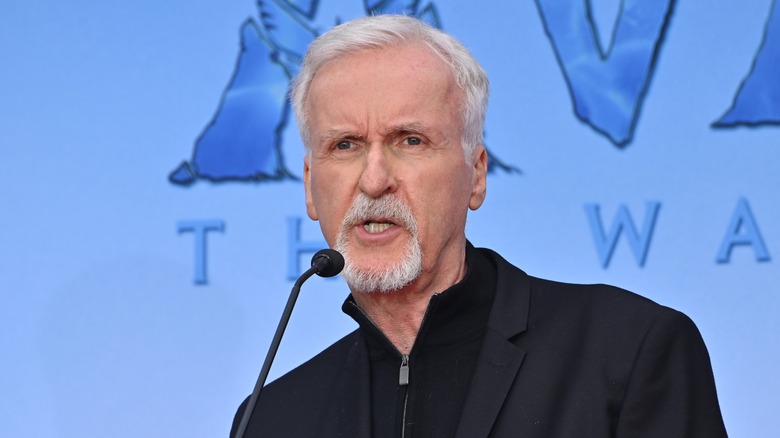 James Cameron speaking into microphone