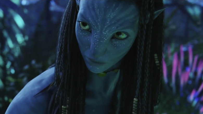 Neytiri wearing a green necklace