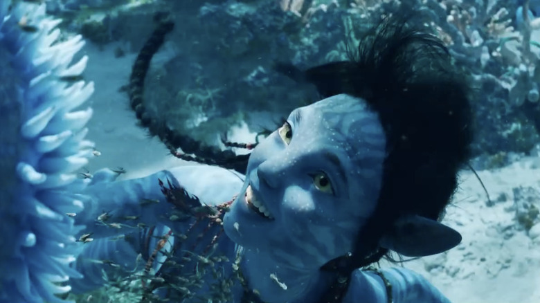 Kiri smiling underwater in Avatar 2