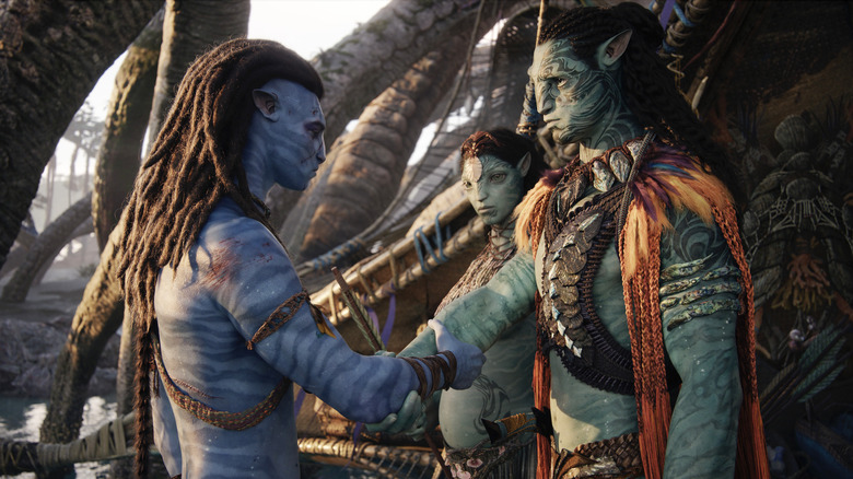 Sam Worthington and Cliff Curtis shaking hands in Avatar