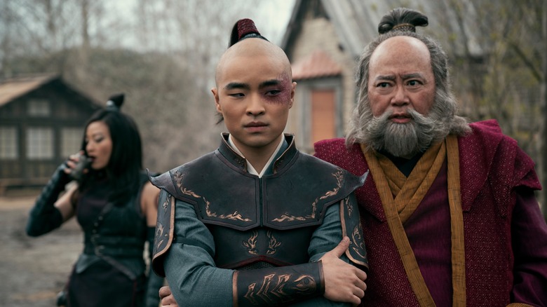 Zuko and Iroh standing near June