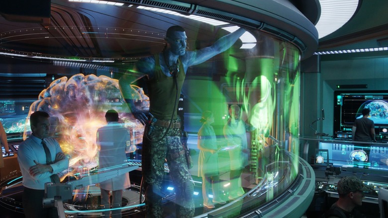 Stephen Lang in looking through lab window in Avatar: The Way of Water