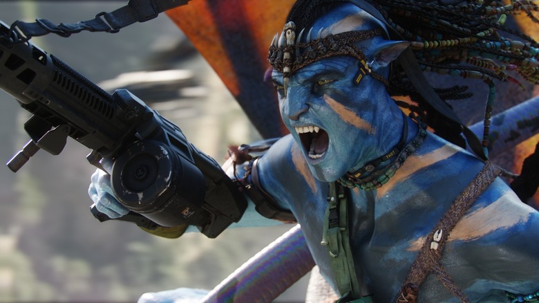 Sam Worthington leaping into battle Avatar