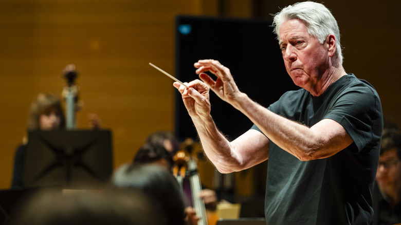 Alan Silvestri conducting an orchestra