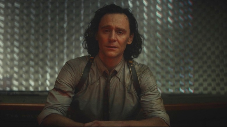 Loki sitting down sad