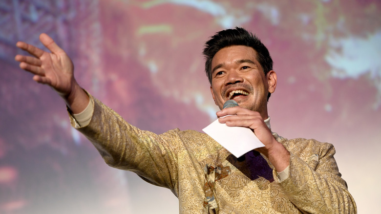 Destin Daniel Cretton smiling with microphone