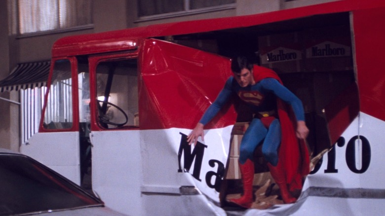 Superman exiting damaged Marlboro truck