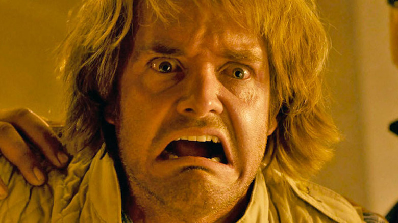 MacGruber grimacing