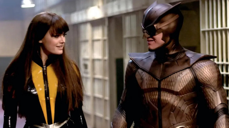 Silk Spectre and Nite Owl exchange smiles