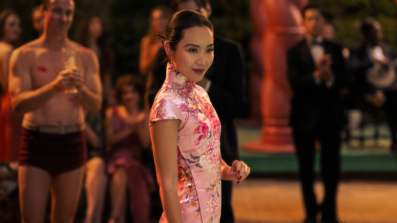 Lady Fay wearing bright, flowered dress