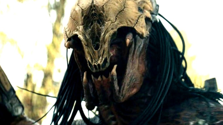 Feral Predator wearing bone helmet