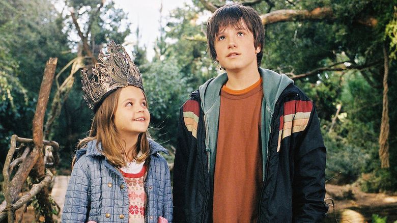 May Belle and Jess standing in the woods