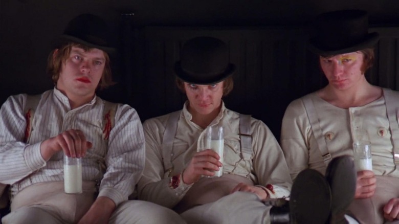 Three droogs drink milk