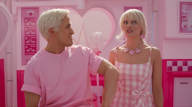 Barbie and Ken in pink house