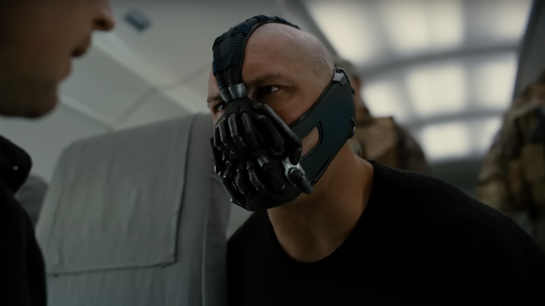 Bane in The Dark Knight Rises sitting in plane