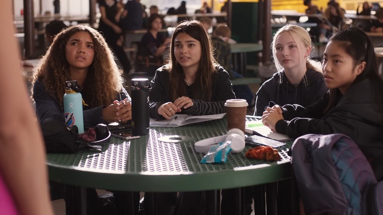 Sasha and her friends glaring at Barbie