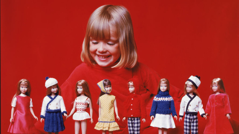 Girl with Skipper dolls