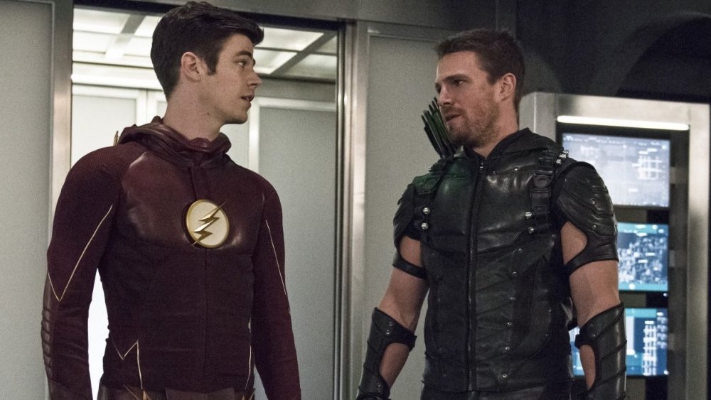 Grant Gustin as Barry Allen and Stephen Amell as Oliver Queen in the Arrowverse