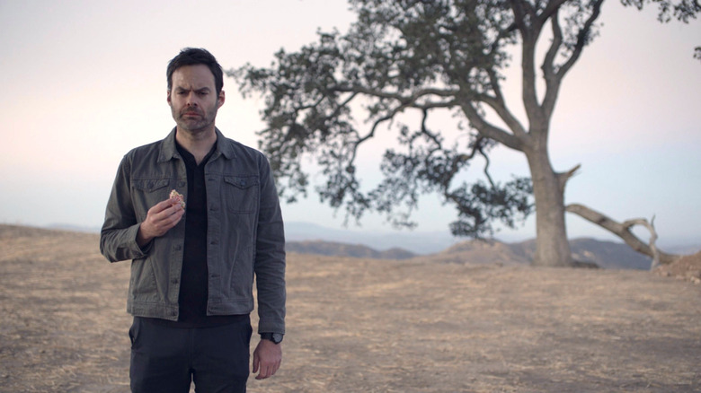 Barry Berkman holding a donut