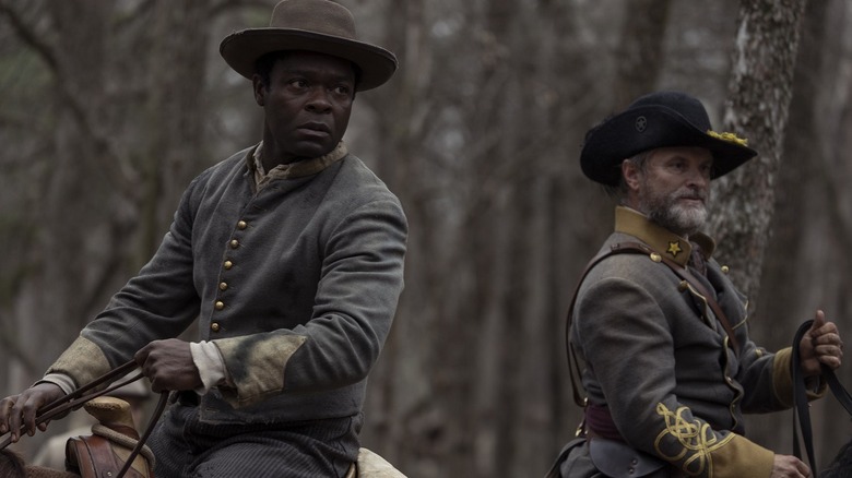 David Oyelewo and Shea Whigham riding horses