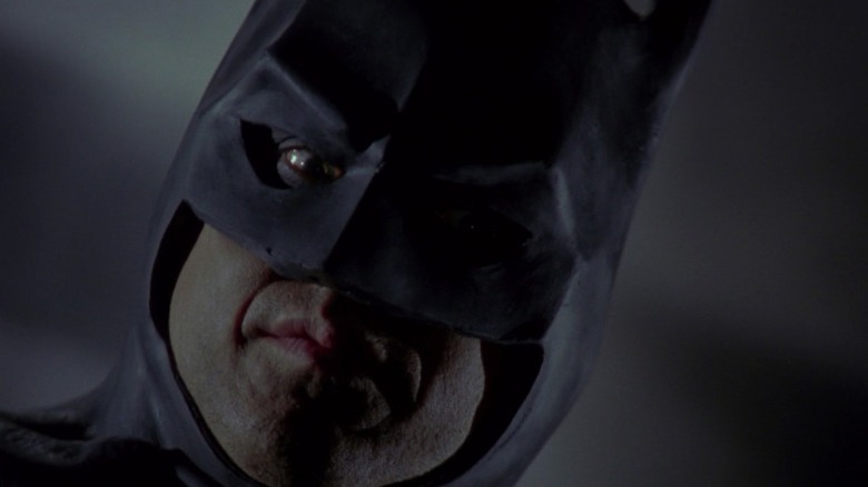 Michael Keaton staring straight ahead as Batman