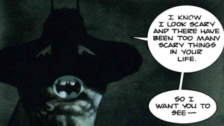 Batman revealing his real face