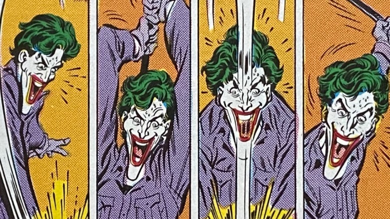 The Joker beating Jason Todd with a crowbar