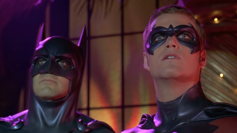 Batman and Robin look up surprised