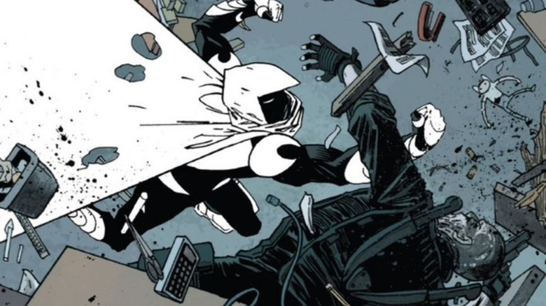 Moon Knight punching an enemy