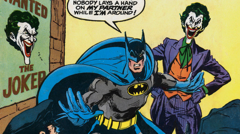 Batman protects the Joker