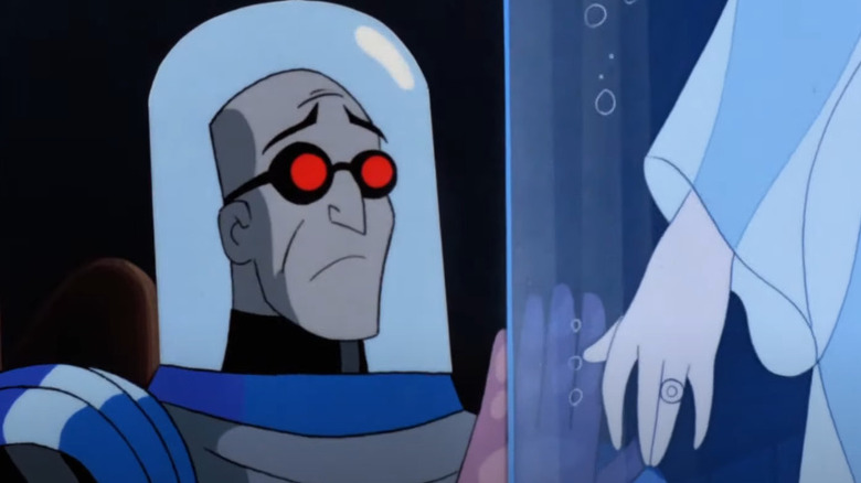 Mr. Freeze stares sadly at wife