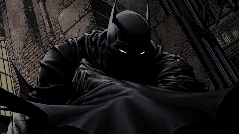 Batman hides face with cowl