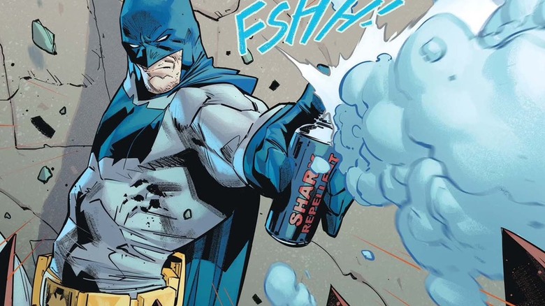 Batman sprays can in new costume