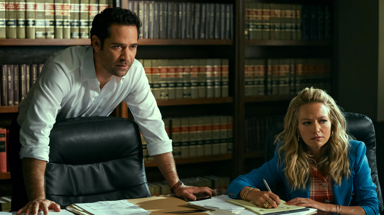 Lorna and Mickey working at the law office