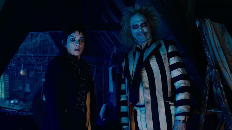 Astrid and Beetlejuice standing in attic