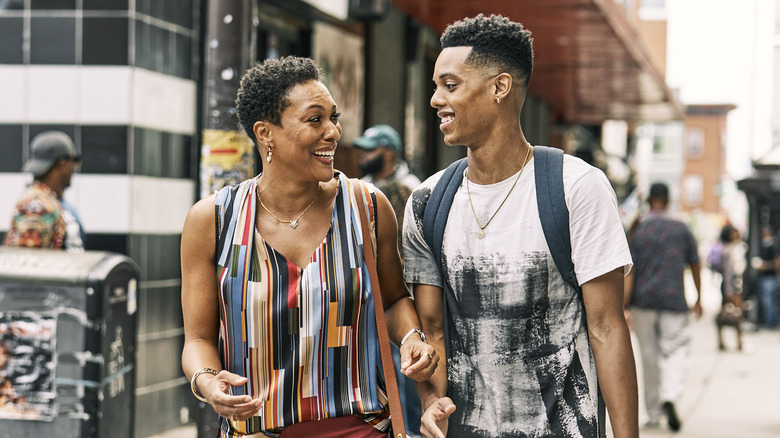 Will walking with his mother Vy in West Philadelpia