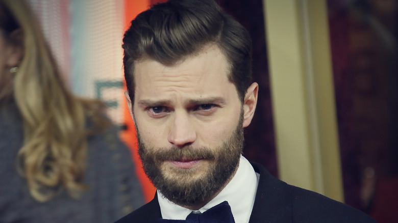 Actor Jamie Dornan looking at camera