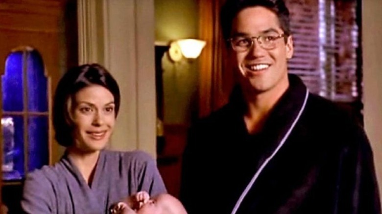 Lois and Clark smiling