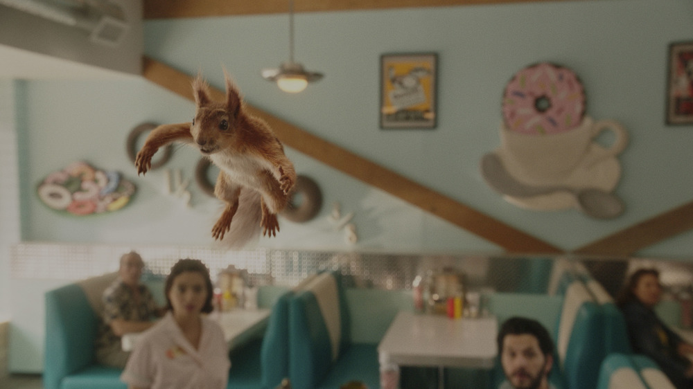 Kate Micucci as Rita, Ben Schwartz as George, and Ulysses the squirrel in FLORA & ULYSSES, exclusively on Disney+