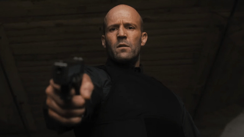 Jason Statham pointing gun