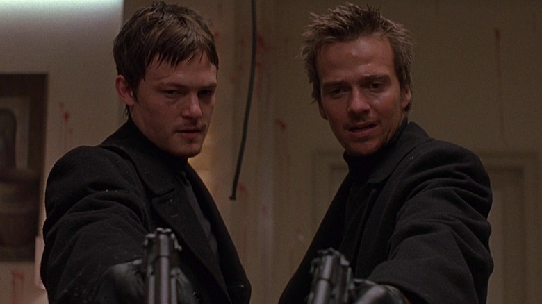 Connor and Murphy MacManus with guns