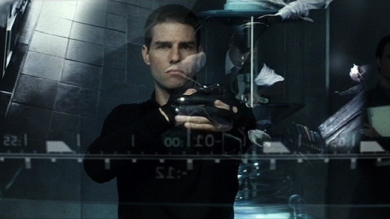 Tom Cruise behind glass screen