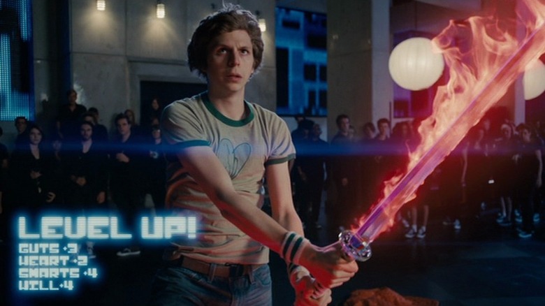 Michael Cera holds sword