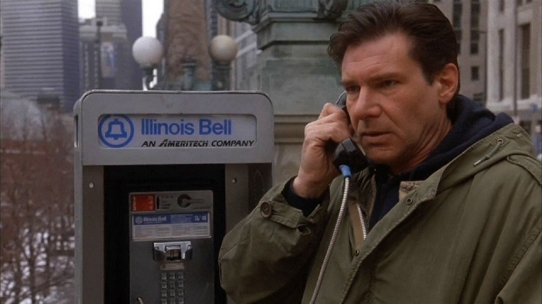 Harrison Ford using telephone