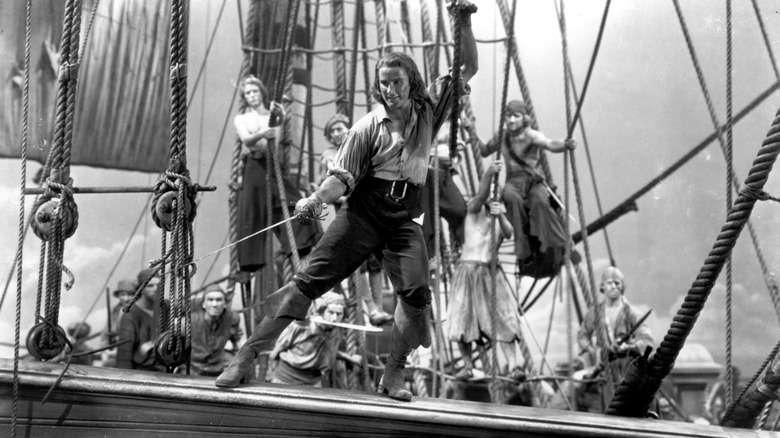 Captain Peter Blood standing on ship