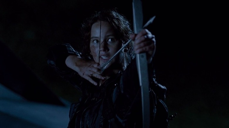 Katniss aims bow